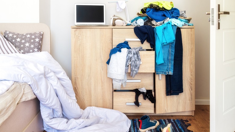 a cluttered dresser