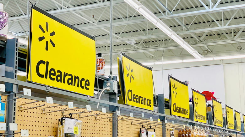 Walmart clearance aisle, yellow signs