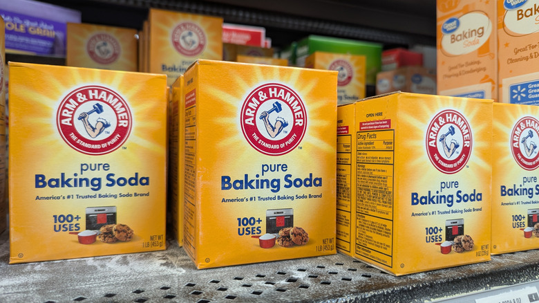 Packets of baking soda on the shelf in a supermarket or other big box retailer.