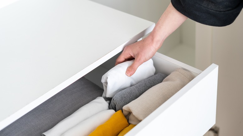 clothes in drawer stacked vertically 