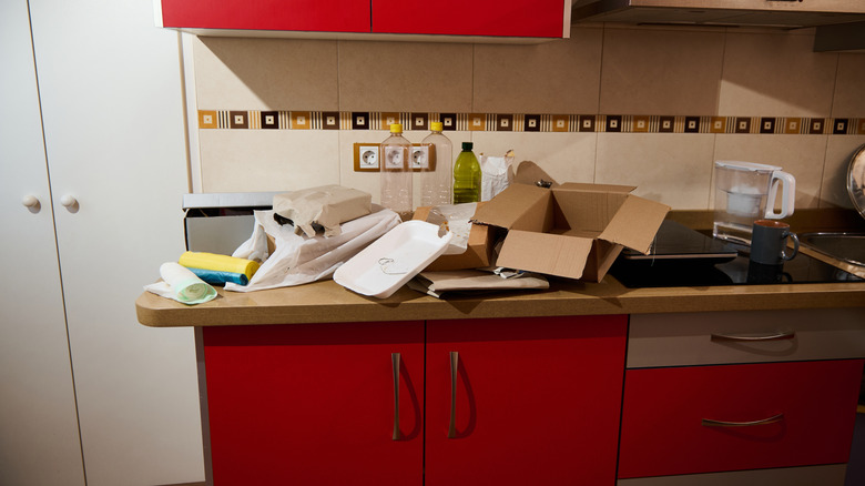 A cluttered kitchen countertop