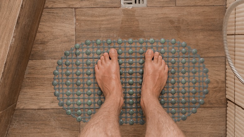 Feet on shower mat