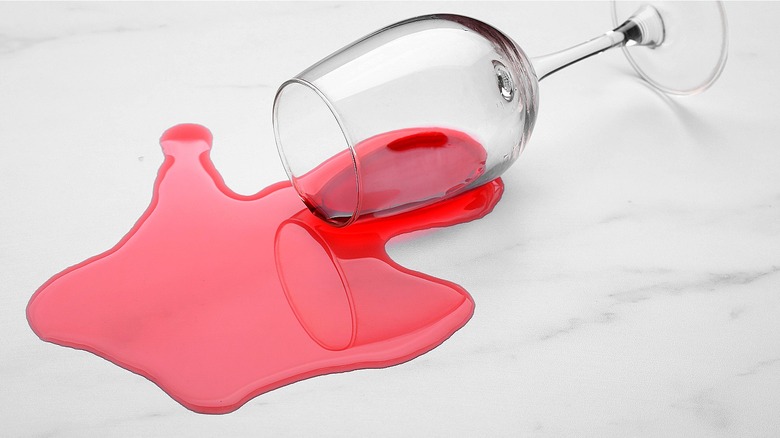 wine spilled on marble floor