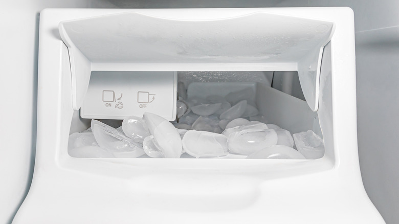 View of an ice maker in a fridge