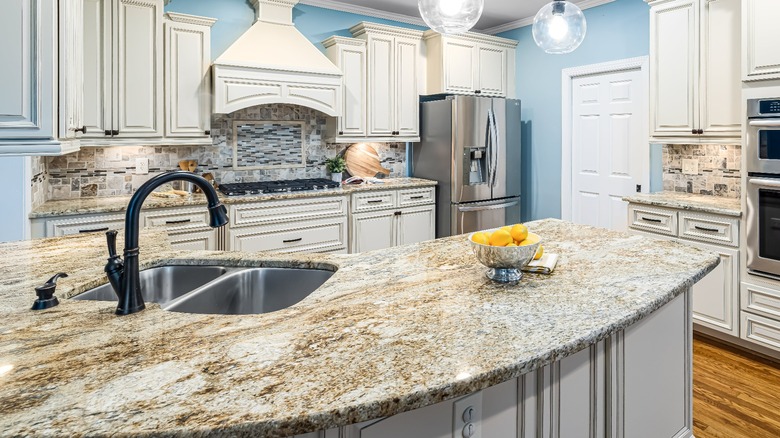 Beige and white granite kitchen countertop