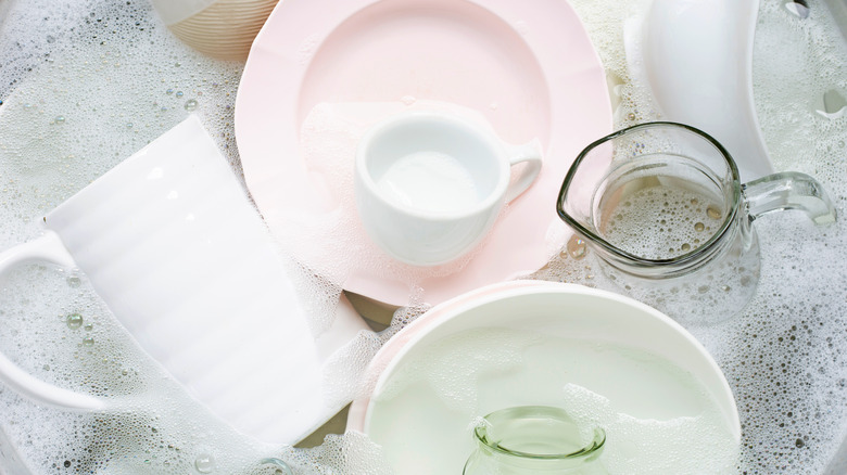 soaking dishes in sink