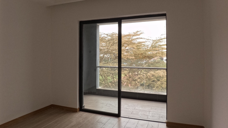 A view of sliding doors leading to an outdoor balcony