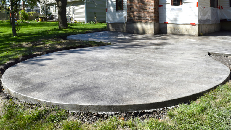 A smooth round concrete patio