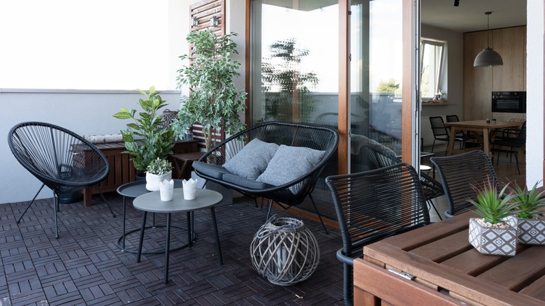 outdoor patio black Ikea tile and furniture