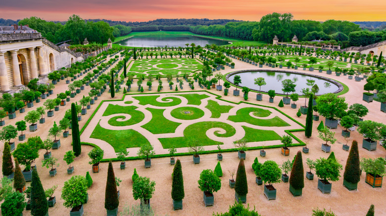 Versailles formal garden at sunset