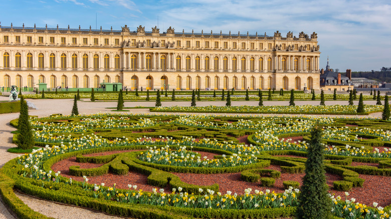 Versailles formal garden at sunset