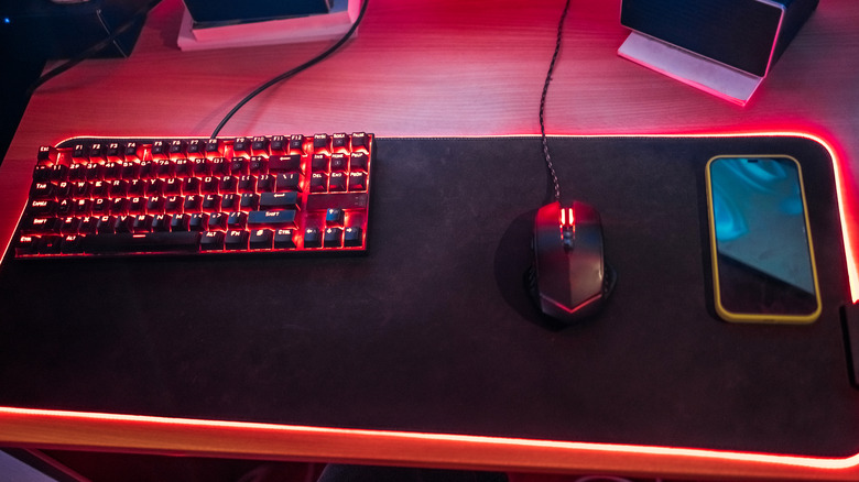 A fancy mouse pad gaming setup
