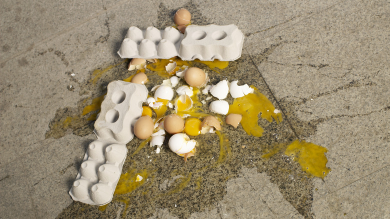 Smashed eggs on concrete