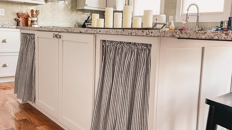 curtains over open kitchen shelving