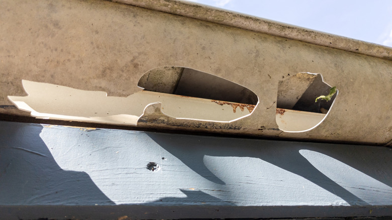 Damaged gutters after a hailstorm