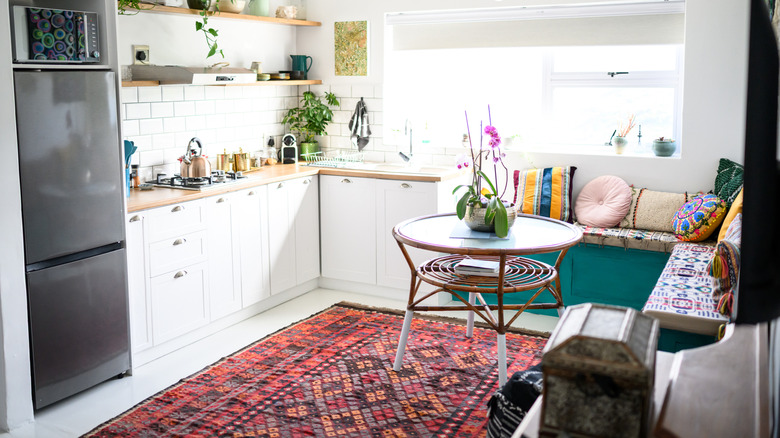 Colorful rug on kitchen floor