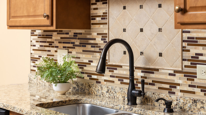 Mediterranean kitchen with stone countertops