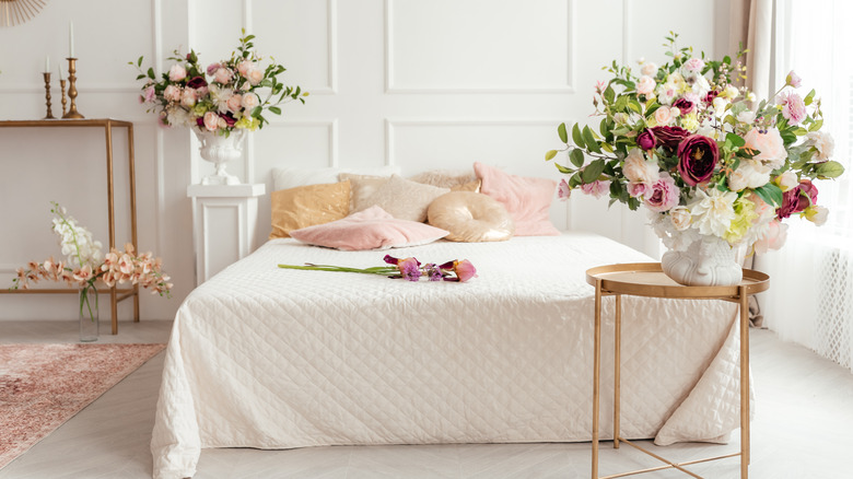 White bedroom with roses