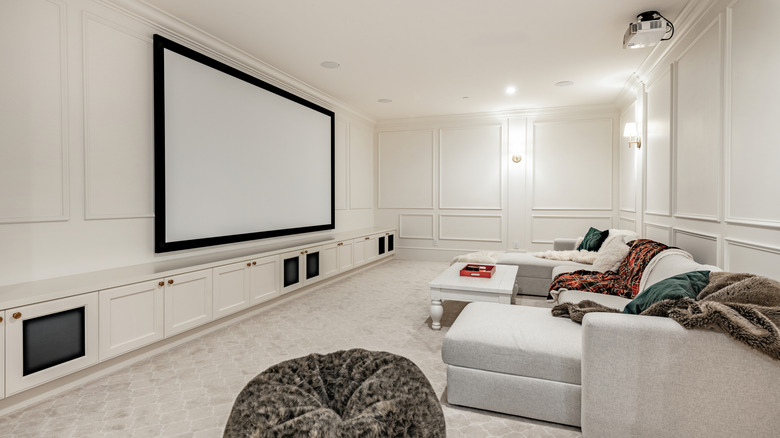 Simple home media room with the basics, including a projector and screen