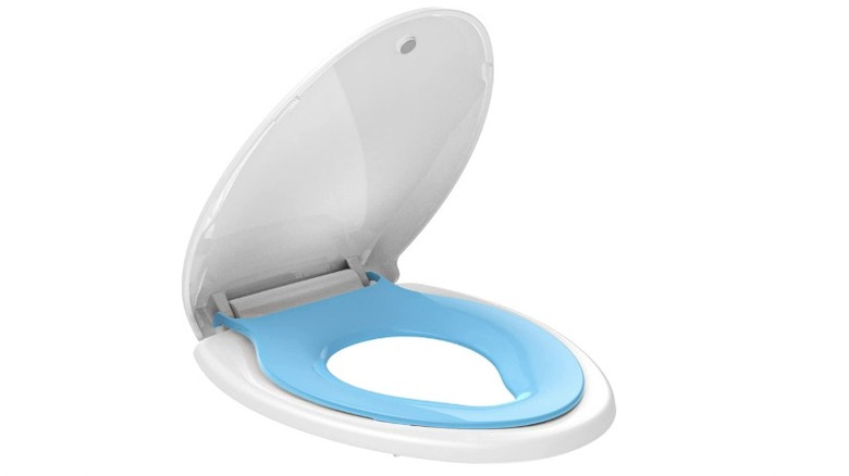 Toilet seat with built-in training seat