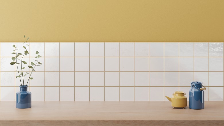 Butcher block countertop with blue and yellow vases