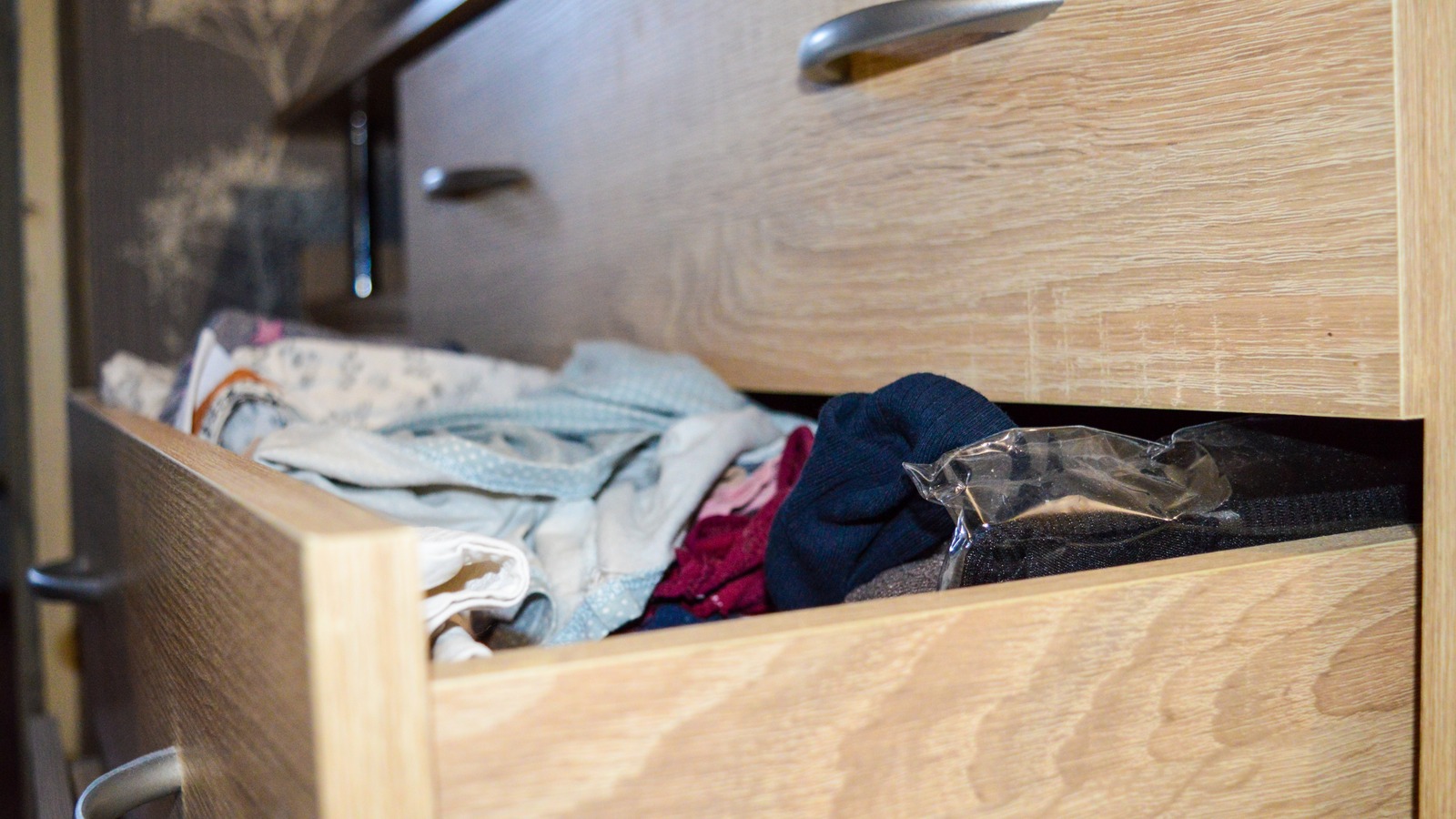 How To Keep Dresser Drawers From Sliding Out With An Easy Fix