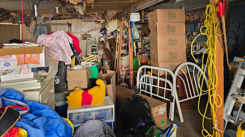 Cluttered garage with lots of boxes