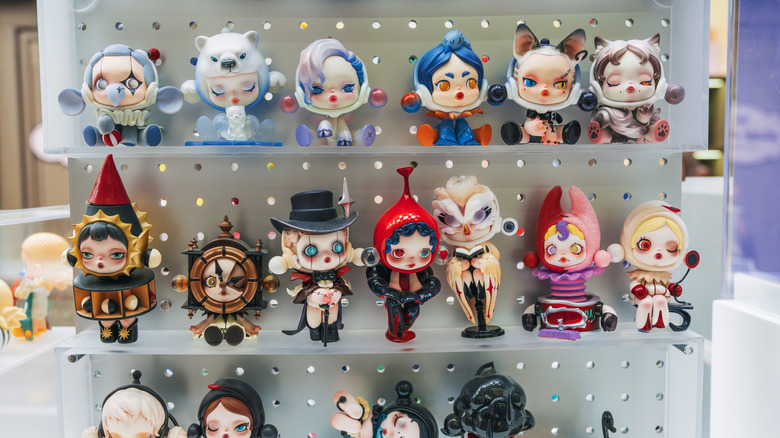 A selection of collectable toys neatly arranged on a shelf