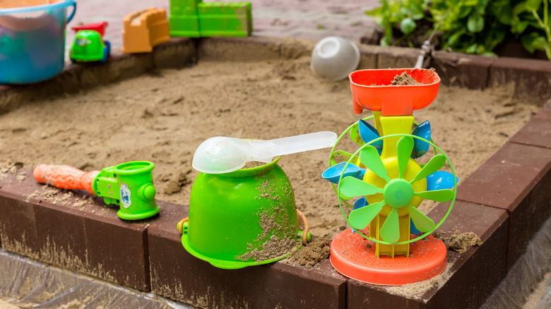 sandbox with toys