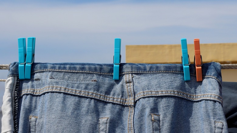 How to hang pants on a hanger so they dont crease