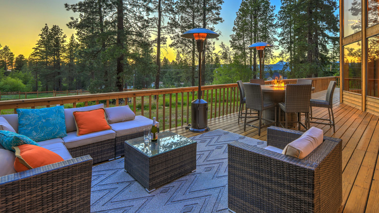 Patio with furniture and rug