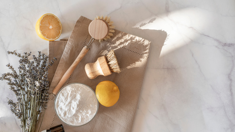 baking soda, lemon, and brushes