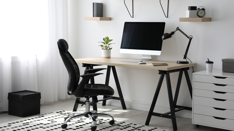 Black wheeled desk chair