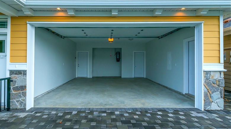 Empty garage with door up