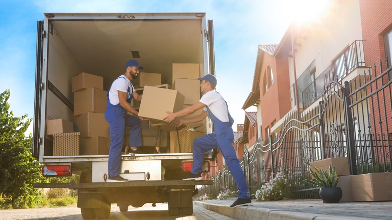 movers packing a truck