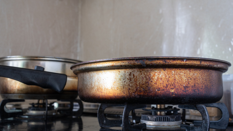 A pan with a browned, burnt bottom