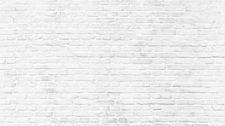 whitewashed brick wall