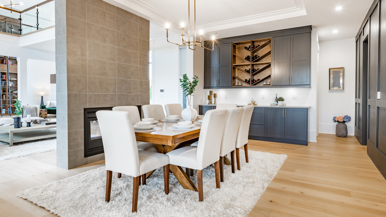 dining room with white chairs