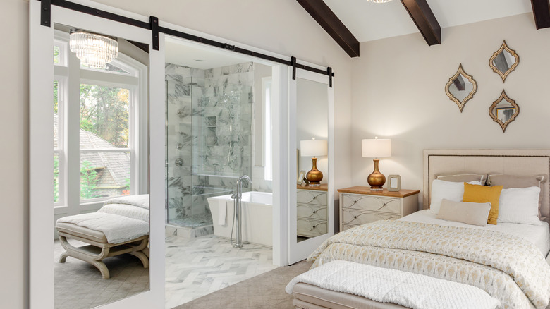 Carpeted bedroom with en-suite bathroom