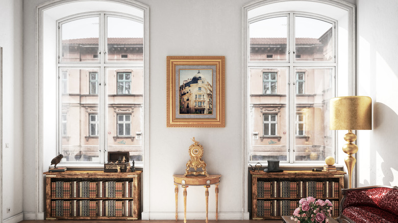 Neutral living room with vintage wooden bookshelves