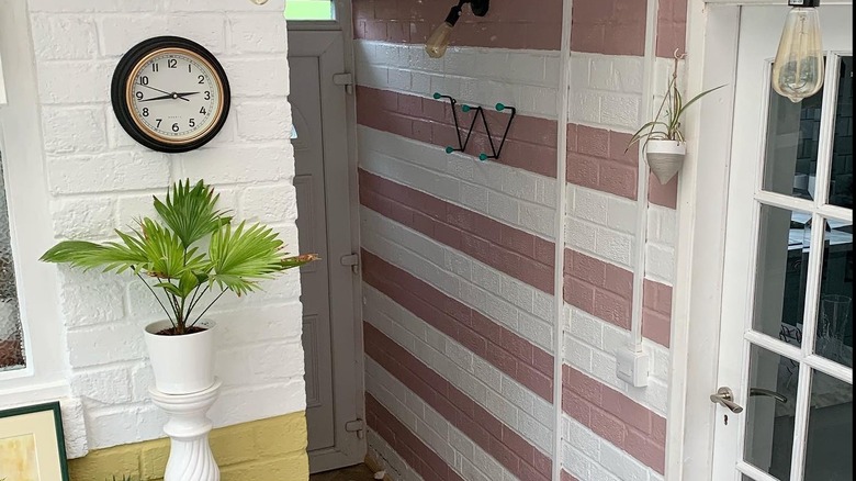 Pink and white double-striped brick wall