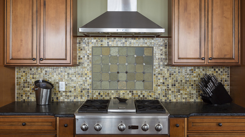 modern kitchen backsplash with multi-color tiles