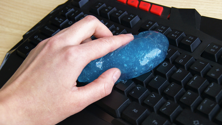 hand cleaning keyboard with slime