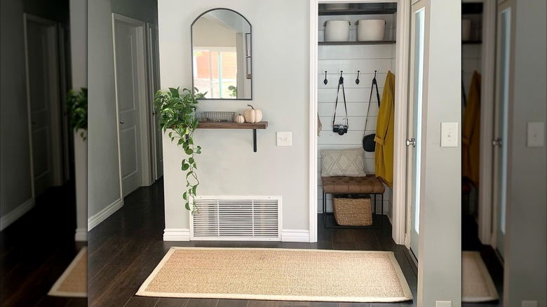 Small entryway with rug and practical decor