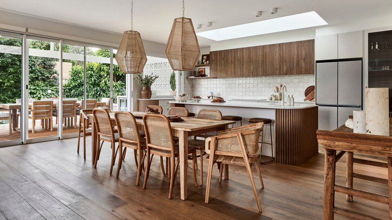 Modern coastal kitchen with mixed wood furniture and cabinetry