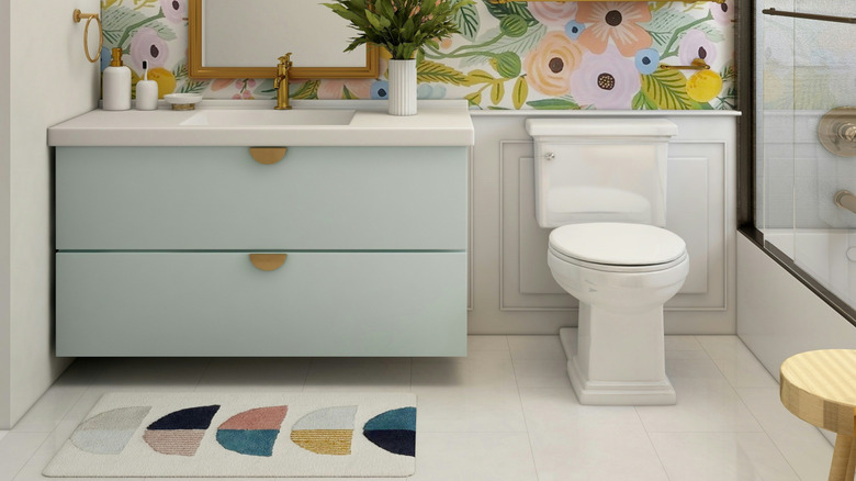 Contemporary bathroom with colorful floral wallpaper
