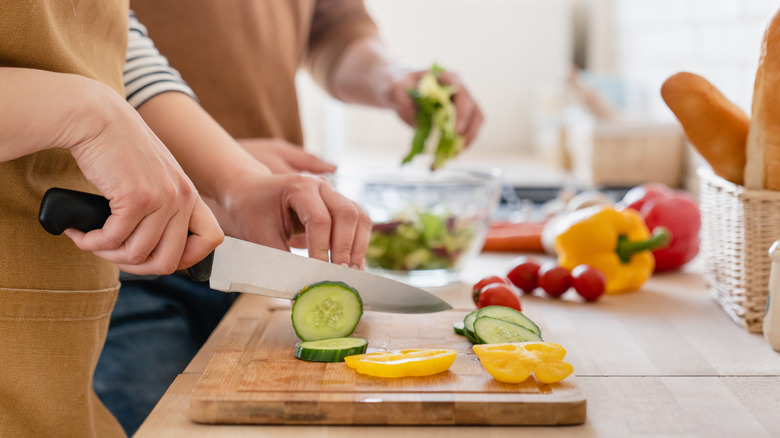 Slicing cucumbers on board