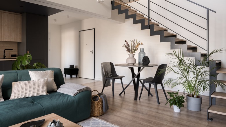 living room sharing space with dining area