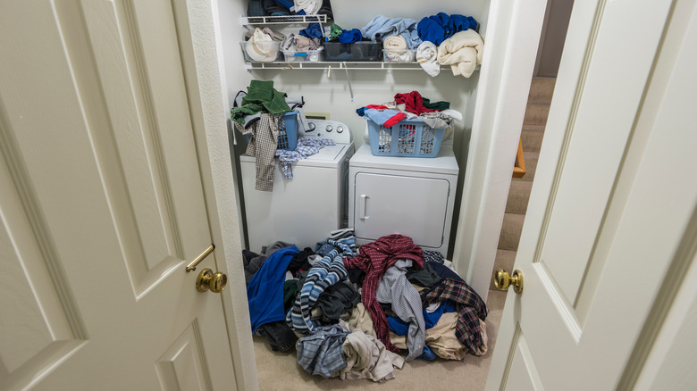 cluttered laundry room