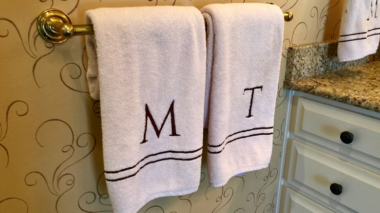 monogrammed towels hanging in bathroom